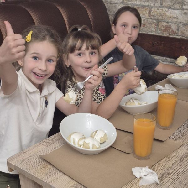 Children at the school summer day camp take part in a traditional halushky workshop
